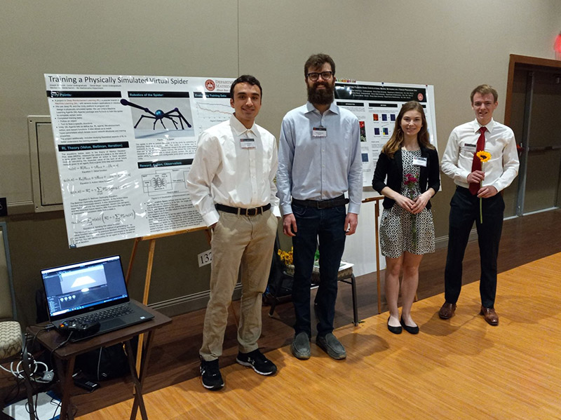 Group of four sudents participating in the ISU Symposium.